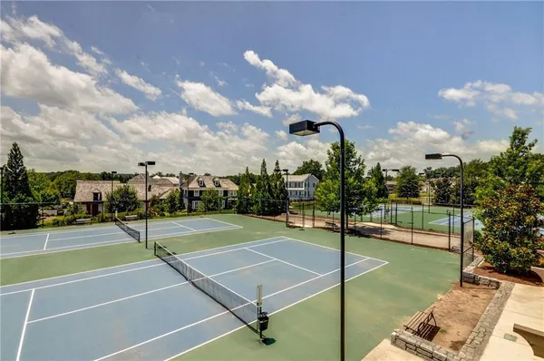 a view of the street with houses