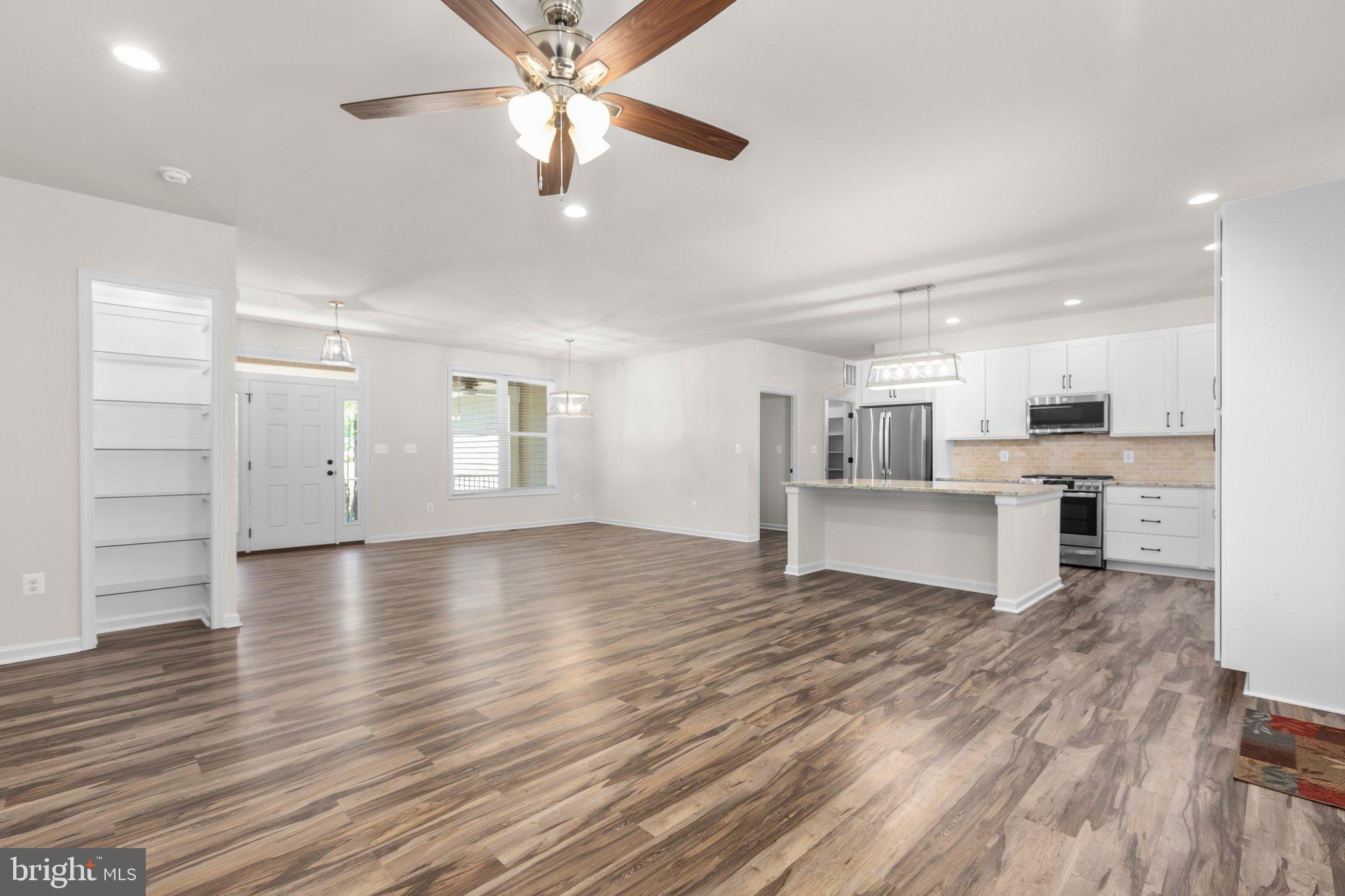 4331 French Acors Road Spotsylvania, VA 22551 - Photo 12 of 42 Spacious, modern open-concept living area.