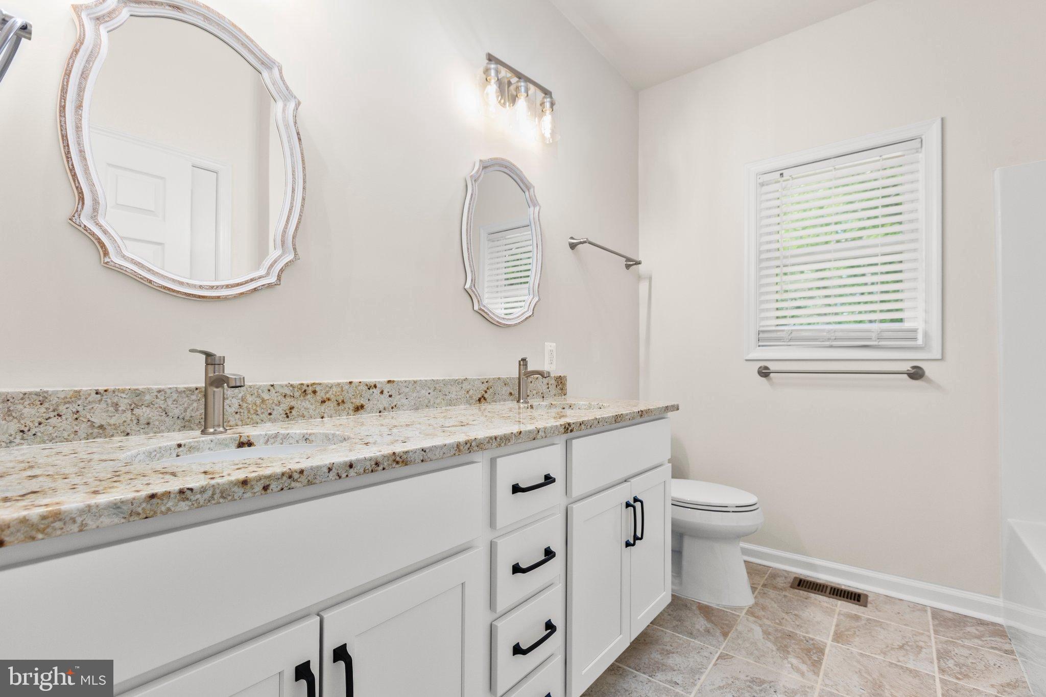 4331 French Acors Road Spotsylvania, VA 22551 - Photo 23 of 42 Elegant bathroom with dual vanities.