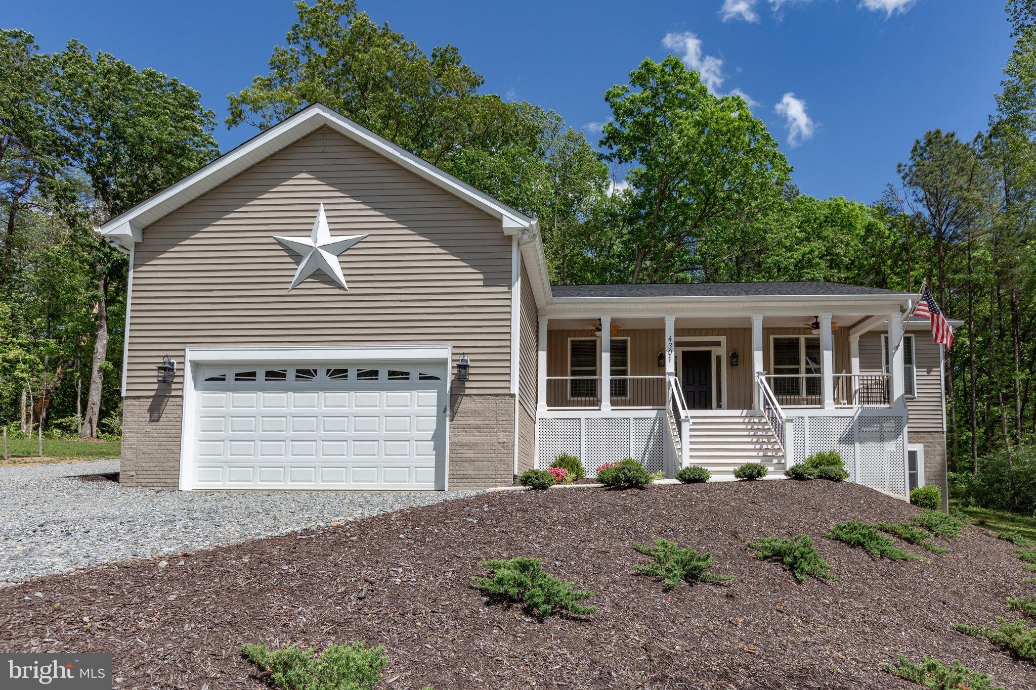 4331 French Acors Road Spotsylvania, VA 22551 - Photo 3 of 42 Charming home with inviting porch and greenery.