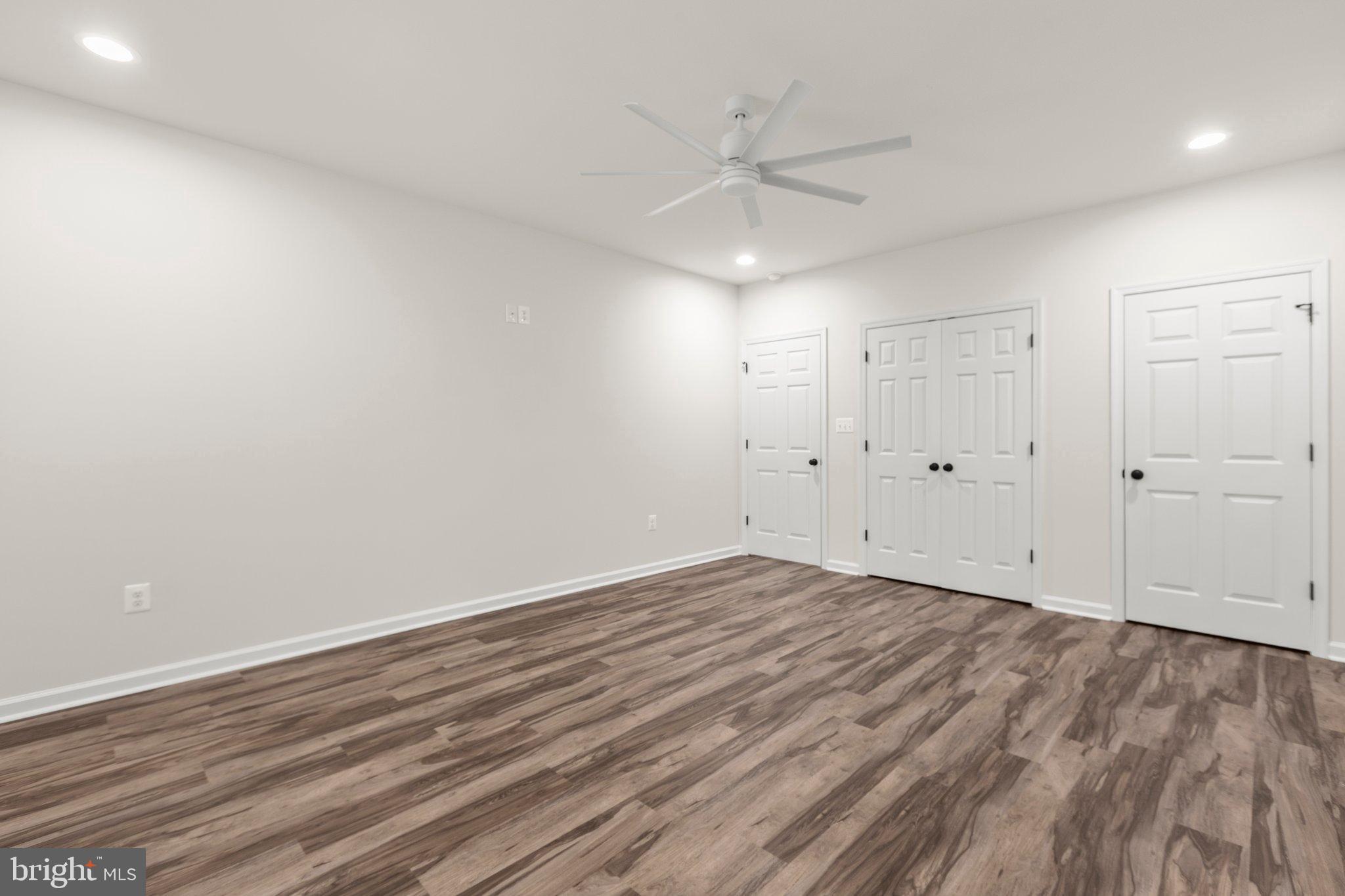 4331 French Acors Road Spotsylvania, VA 22551 - Photo 32 of 42 Spacious, modern room with sleek finishes.