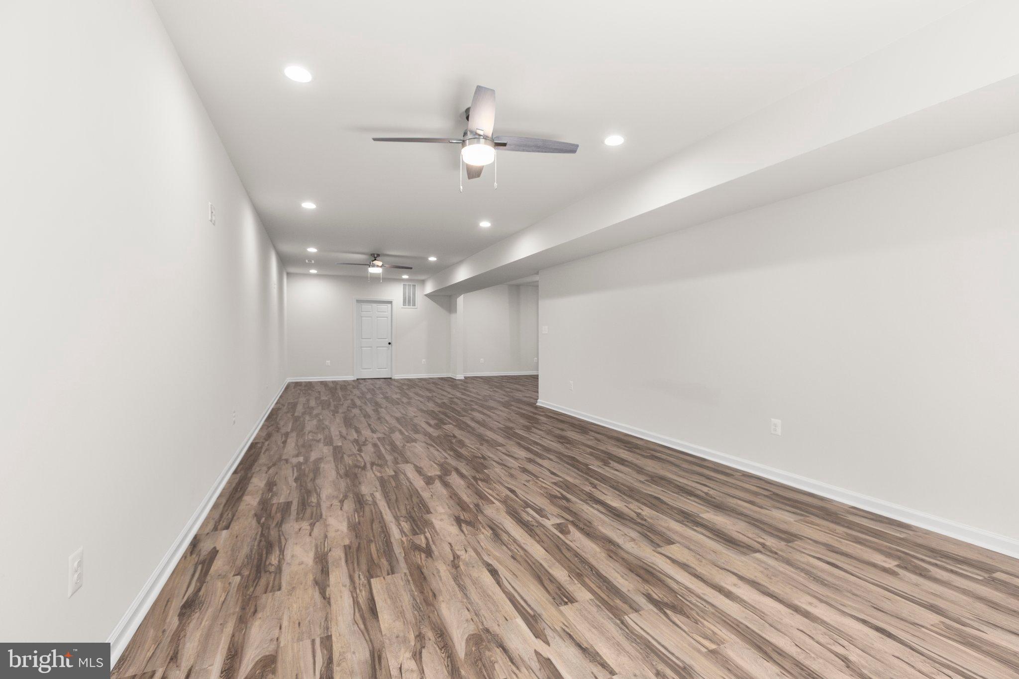 4331 French Acors Road Spotsylvania, VA 22551 - Photo 33 of 41 Spacious, modern interior with sleek flooring.