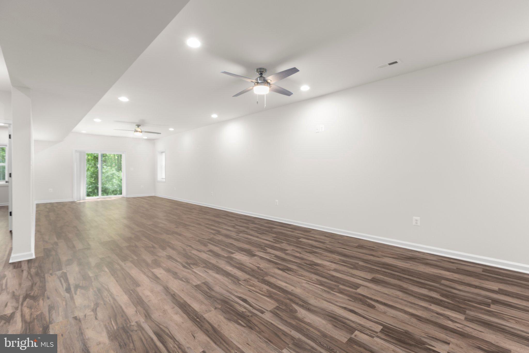 4331 French Acors Road Spotsylvania, VA 22551 - Photo 36 of 42 Spacious, modern living area with natural light.