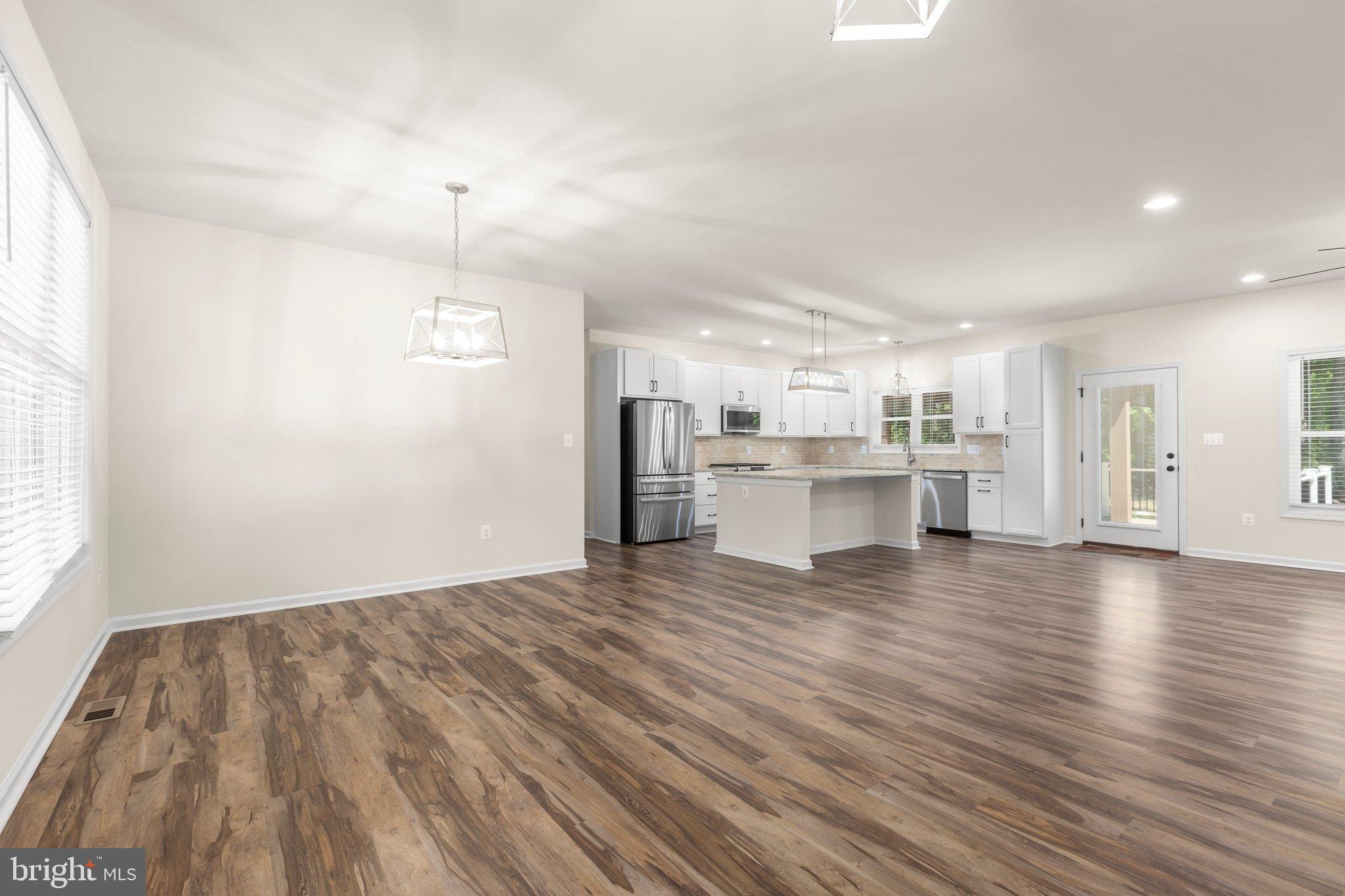 4331 French Acors Road Spotsylvania, VA 22551 - Photo 6 of 42 Spacious open-concept living area with light.