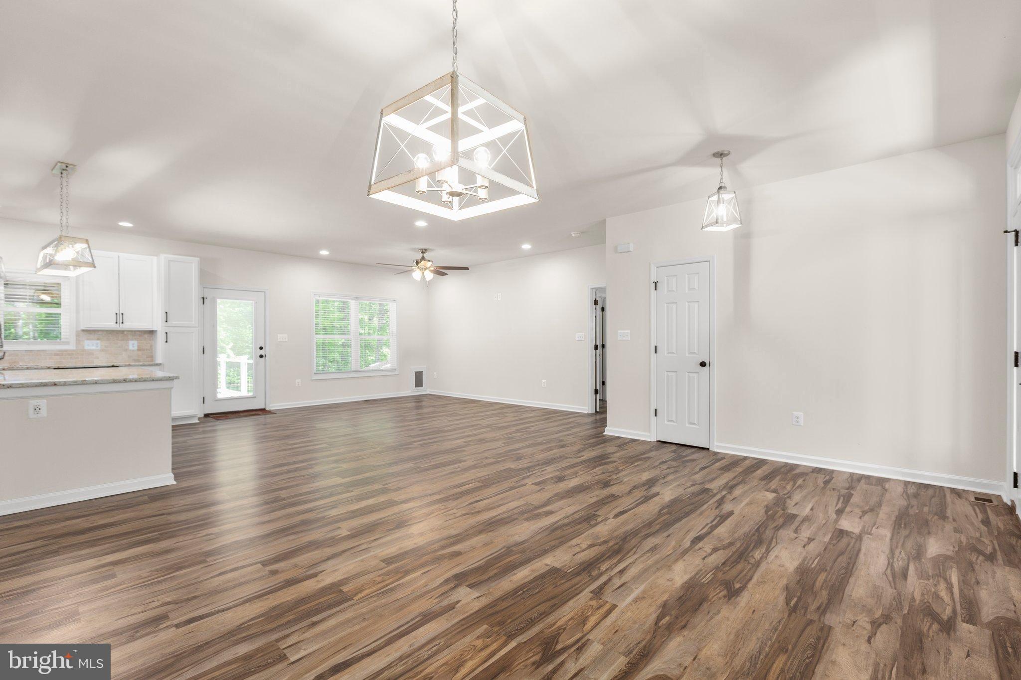 4331 French Acors Road Spotsylvania, VA 22551 - Photo 7 of 42 Spacious, light-filled open living area.