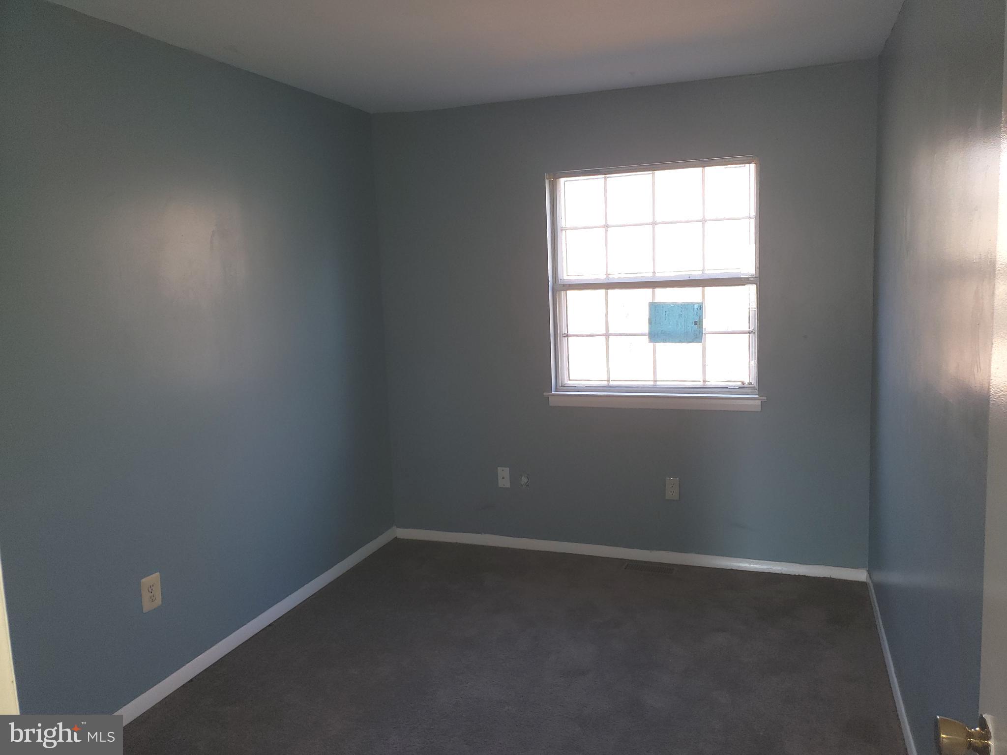 4 Mainview Court Randallstown, MD 21133 - Photo 14 of 25 an empty room with a window