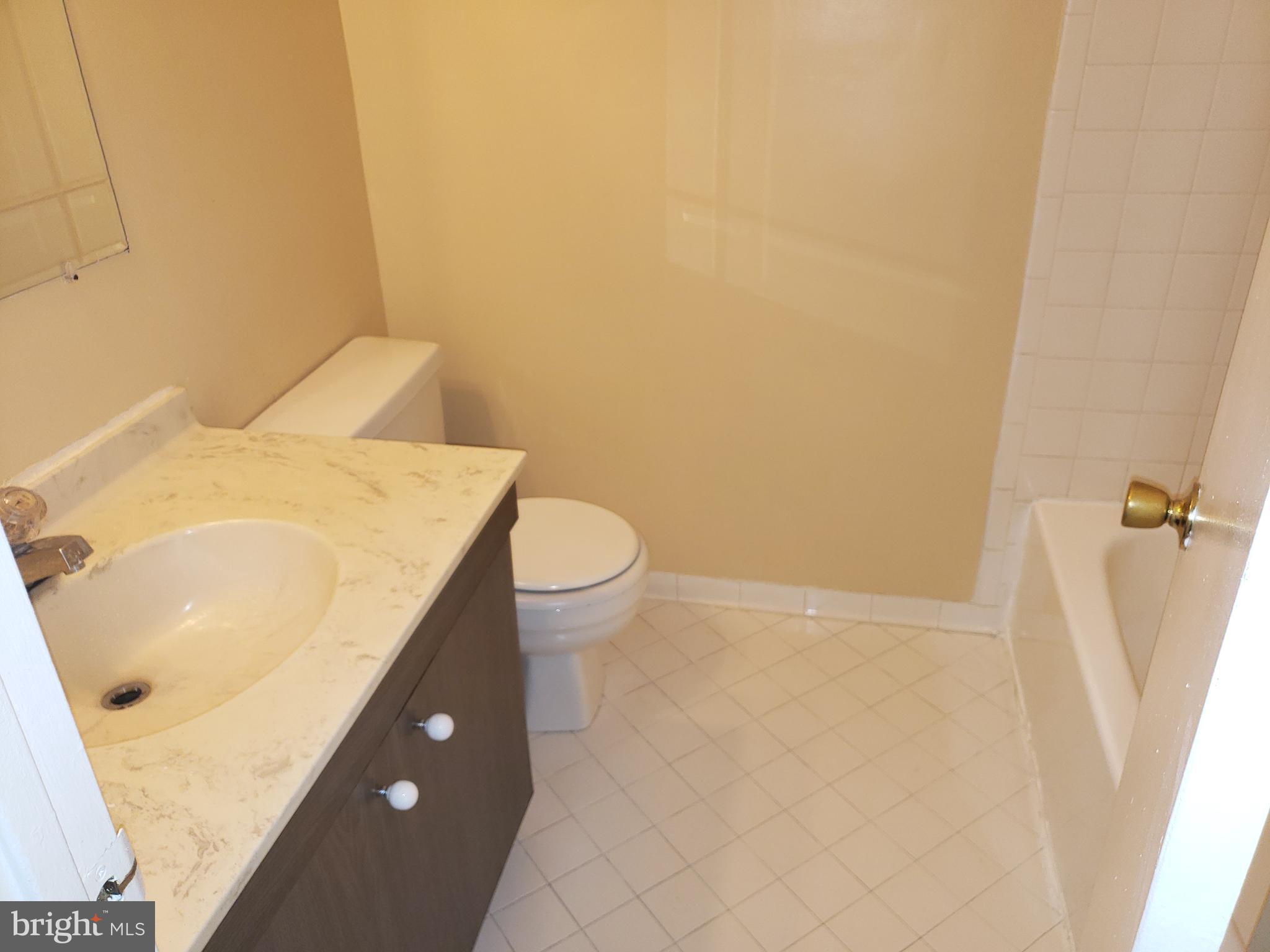 4 Mainview Court Randallstown, MD 21133 - Photo 15 of 25 a bathroom with a sink and a vanity