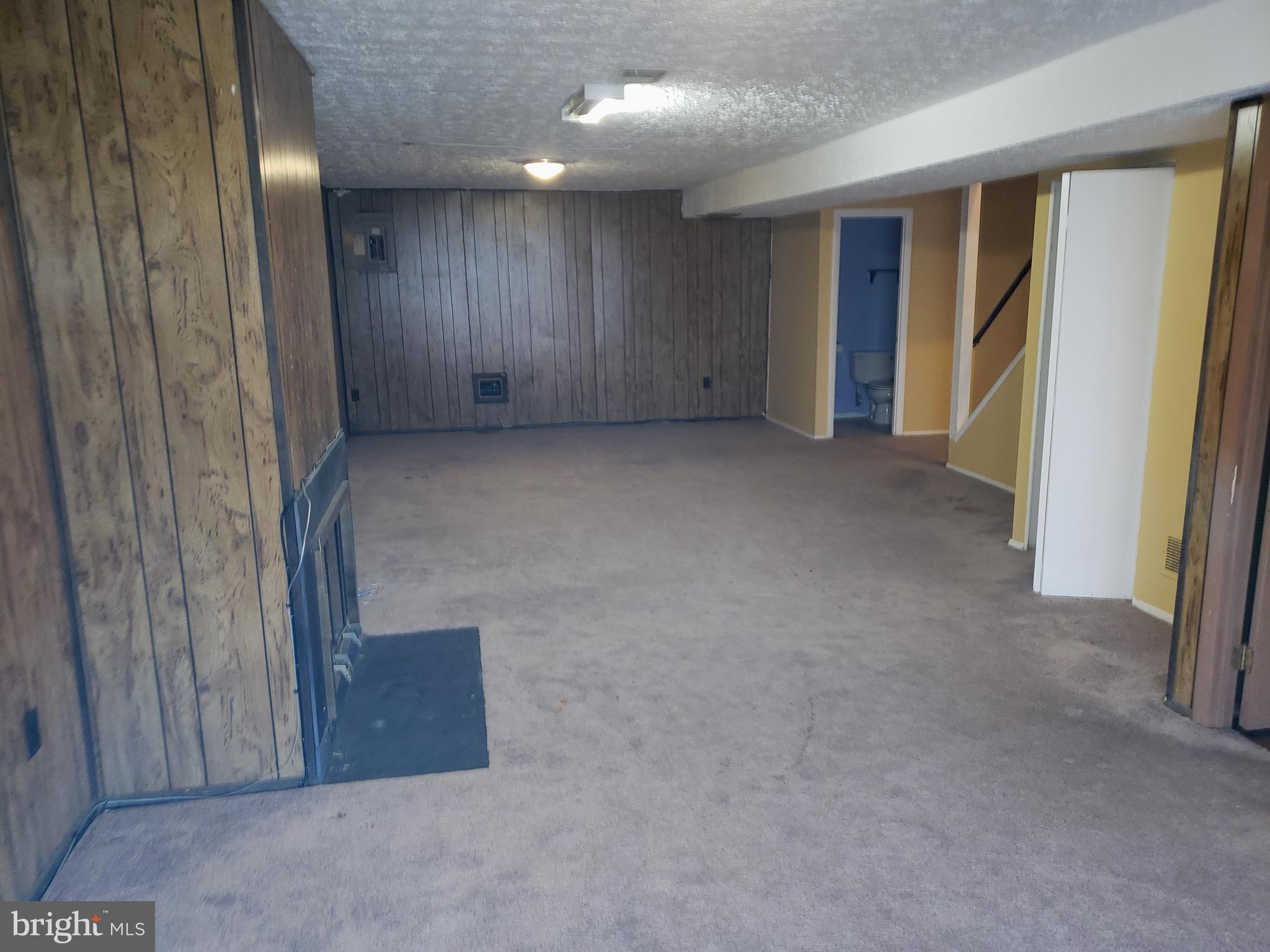4 Mainview Court Randallstown, MD 21133 - Photo 17 of 25 an empty room with closet and wooden door