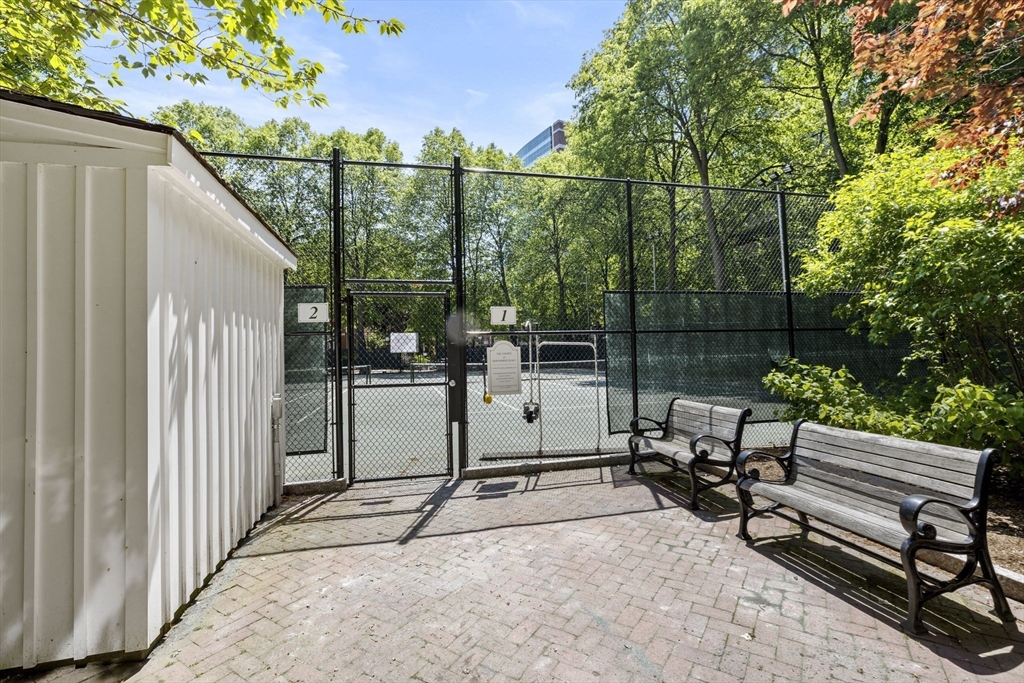 9 Hawthorne Place, Unit 14N Boston, MA 02114 - Photo 13 of 15 a view of a chair and tables in the balcony