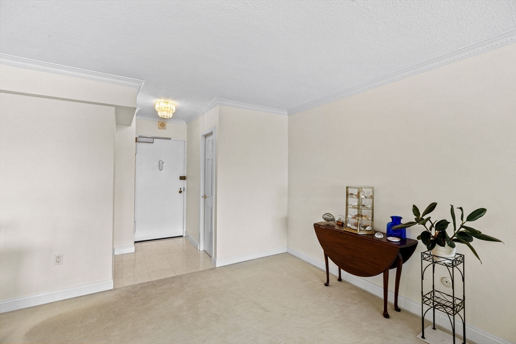 9 Hawthorne Place, Unit 14N Boston, MA 02114 - Photo 5 of 15 a view of a livingroom with furniture