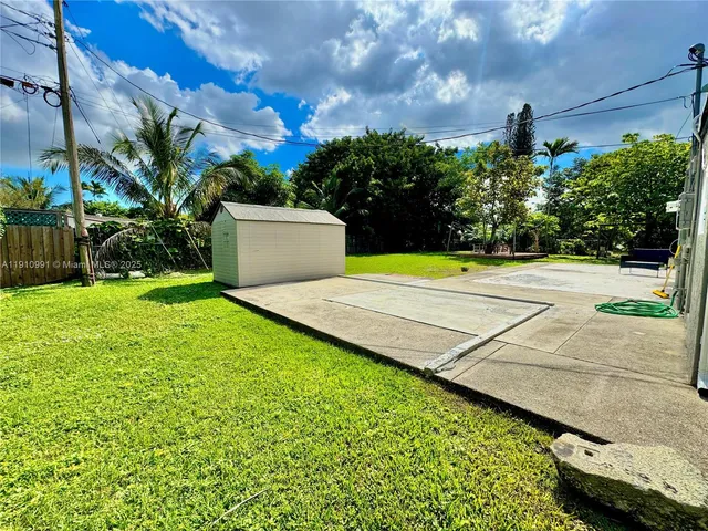 a house view with a garden space