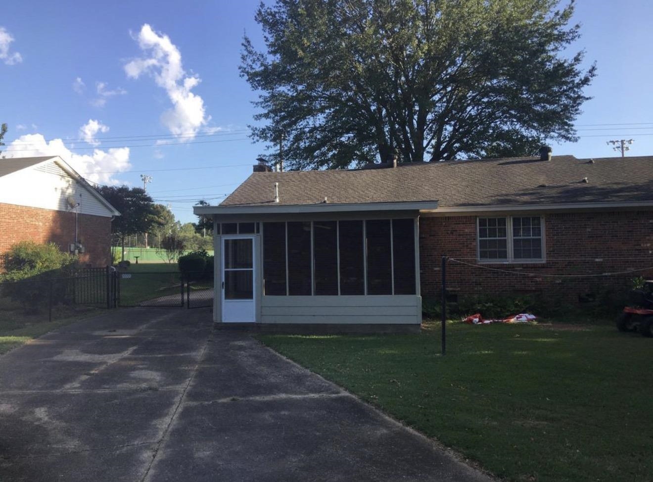73 Hughes Drive Jackson, TN 38305 - Photo 15 of 24 a view of a house with a yard