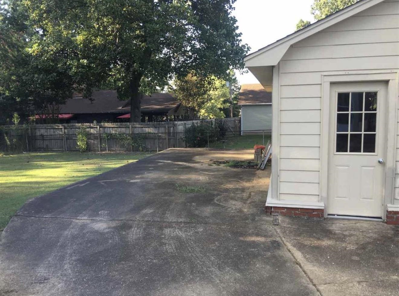 73 Hughes Drive Jackson, TN 38305 - Photo 6 of 24 a view of swimming pool with outdoor seating and yard