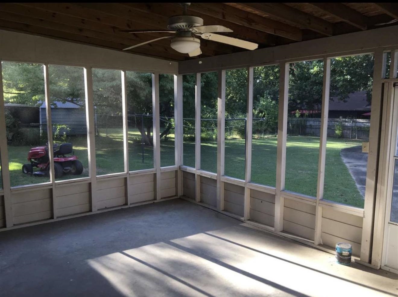 73 Hughes Drive Jackson, TN 38305 - Photo 7 of 24 a view of a room with wooden floor and windows
