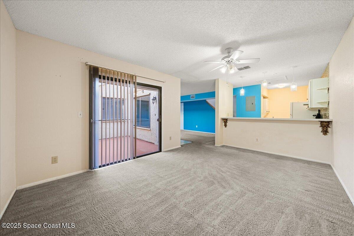 1470 Sheafe Avenue Northeast, Unit 104 Palm Bay, FL 32905 - Photo 13 of 30 09-View to kitchen
