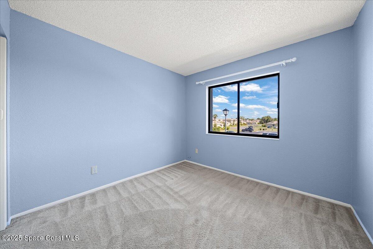 1470 Sheafe Avenue Northeast, Unit 104 Palm Bay, FL 32905 - Photo 22 of 30 18-Bedroom