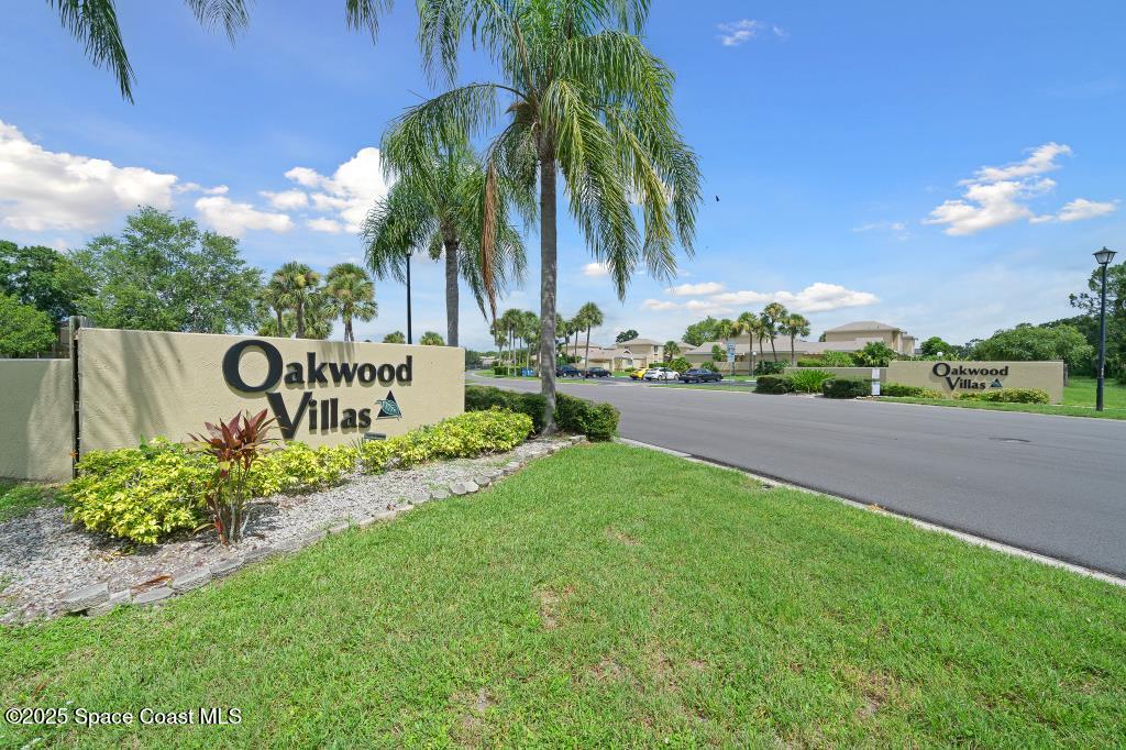 1470 Sheafe Avenue Northeast, Unit 104 Palm Bay, FL 32905 - Photo 3 of 30 Entrance to Community