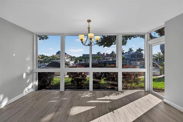 a spacious bedroom with a bed and window