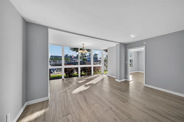 a bathroom with a granite countertop sink a shower and a mirror