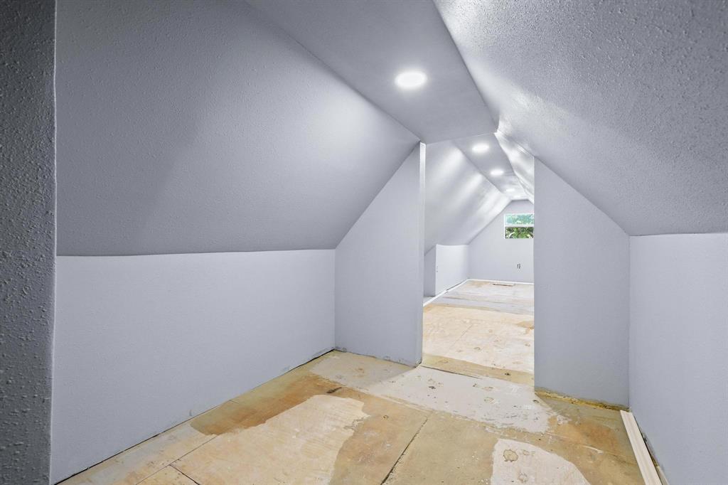 4453 Farm To Market 902 Howe, TX 75459 - Photo 40 of 40 Attic space featuring sloped ceilings, recessed lighting, a window, and light gray painted walls