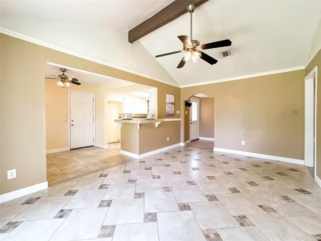 a view of a kitchen with a sink and cabinets
