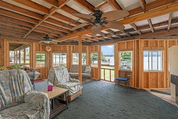 a bed room with furniture and a chandelier