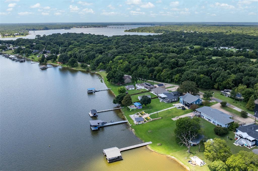 175 Kings Row Malakoff, TX 75148 - Photo 31 of 40 an aerial view of a house with a garden and lake view