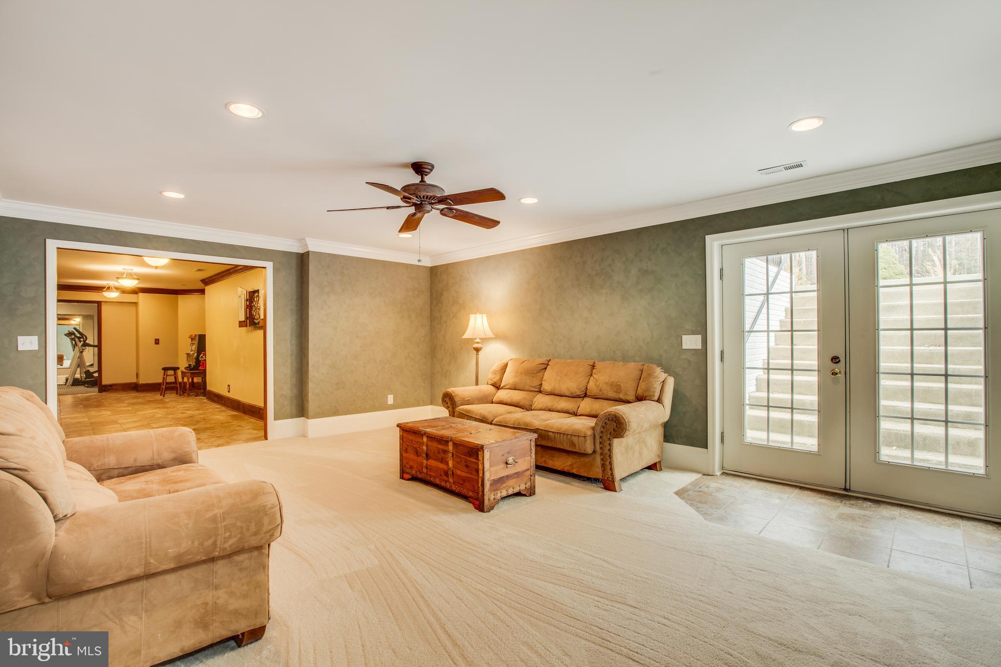 22 Ruffian Drive Stafford, VA 22556 - Photo 33 of 44 Relax in this rec room with walk-up to fenced yard