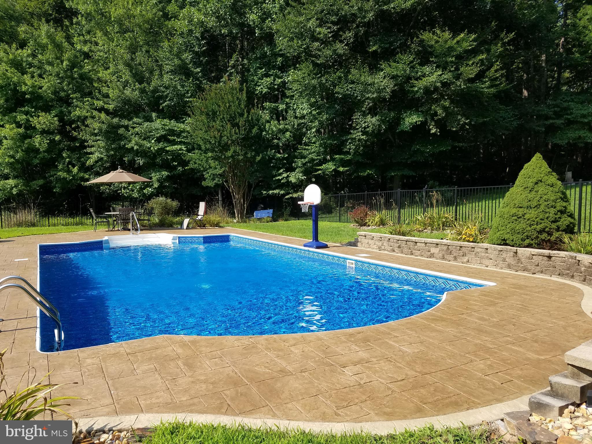 22 Ruffian Drive Stafford, VA 22556 - Photo 41 of 44 Gorgeous pool with trees providing privacy