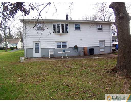 54 Oxford Road Colonia, NJ 07067 - Photo 15 of 18 a view of a house with a yard