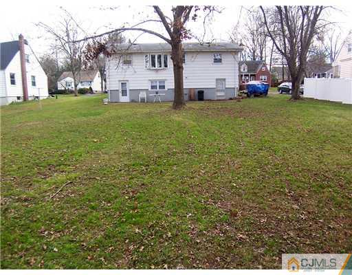 54 Oxford Road Colonia, NJ 07067 - Photo 16 of 18 a view of a yard with a house
