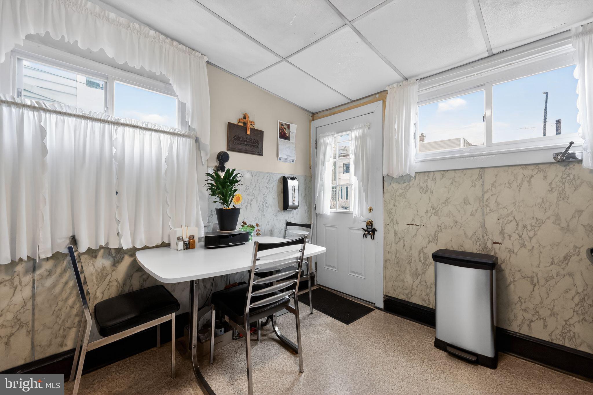 3067 Cedar Street Philadelphia, PA 19134 - Photo 13 of 30 a dining room with furniture and window