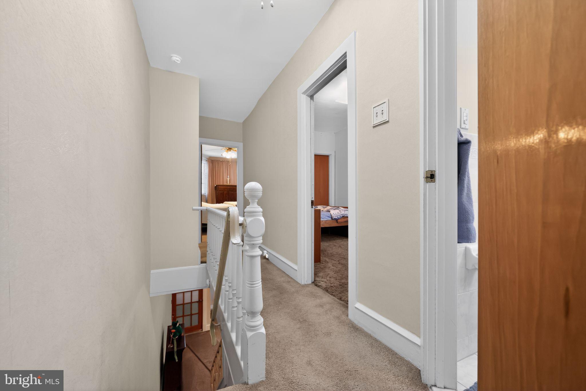 3067 Cedar Street Philadelphia, PA 19134 - Photo 17 of 30 a view of a hallway with furniture and stairs