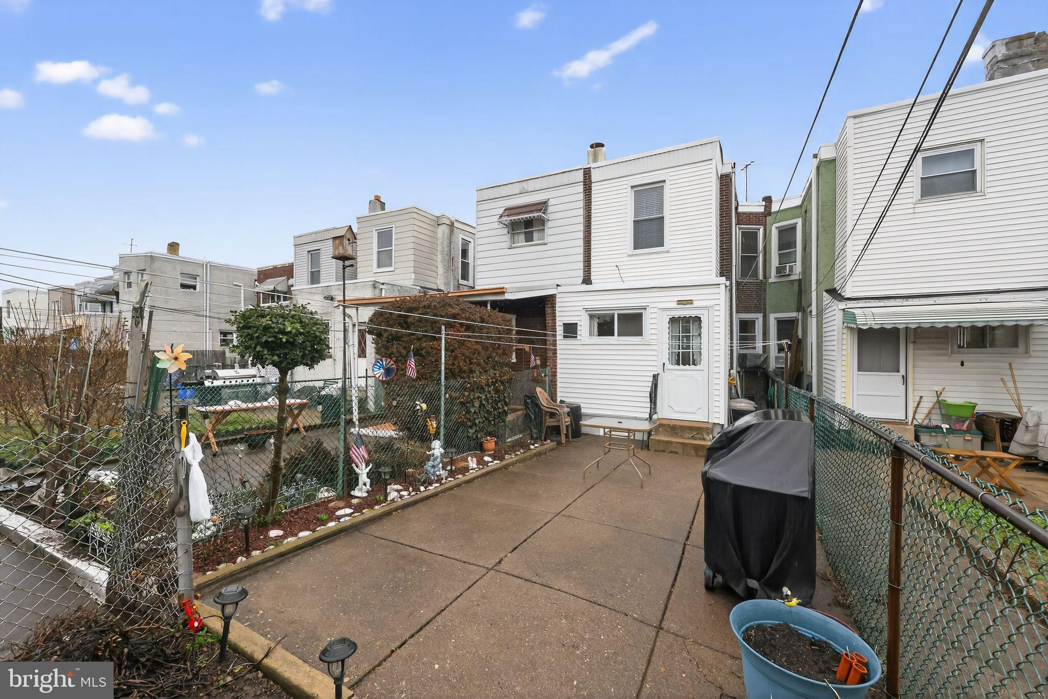 3067 Cedar Street Philadelphia, PA 19134 - Photo 29 of 30 a front view of a house with outdoor seating