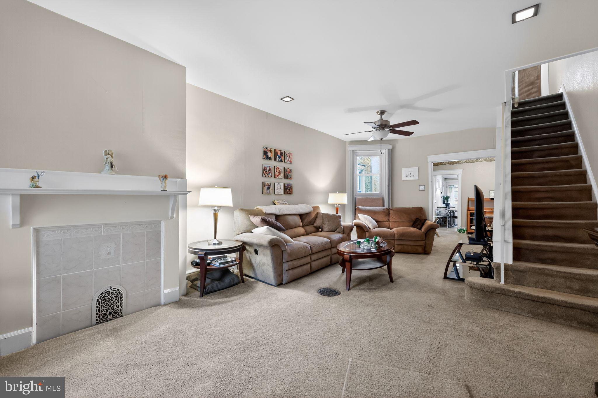 3067 Cedar Street Philadelphia, PA 19134 - Photo 5 of 30 a living room with furniture and a fireplace