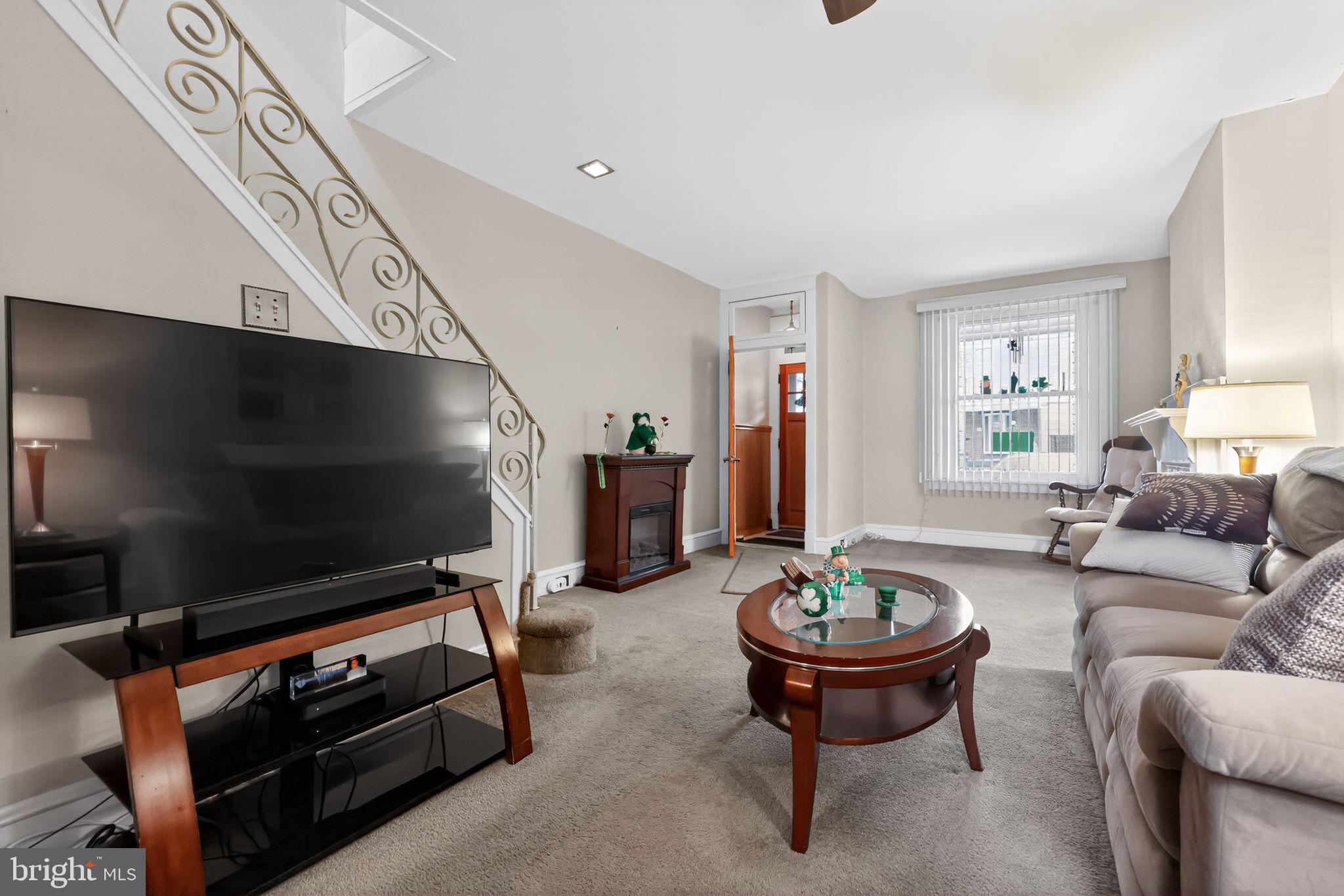 3067 Cedar Street Philadelphia, PA 19134 - Photo 8 of 30 a living room with furniture and a flat screen tv