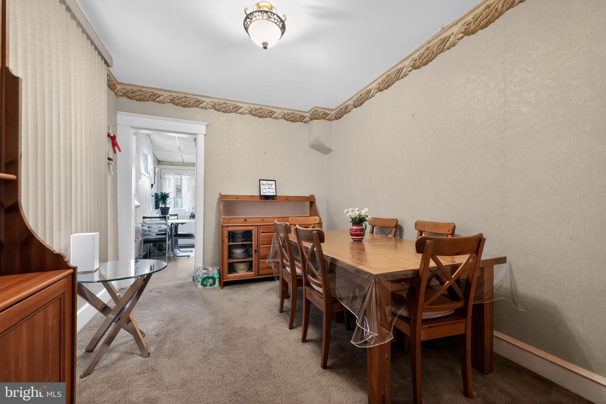 3067 Cedar Street Philadelphia, PA 19134 - Photo 10 of 30 a view of a dining room with furniture and wooden floor