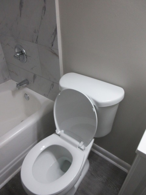 784 Terminal Court, Unit 4 Columbus, GA 31906 - Photo 15 of 22 a toilet sitting in a bathroom next to a sink