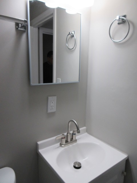 784 Terminal Court, Unit 4 Columbus, GA 31906 - Photo 16 of 22 a bathroom with a sink vanity and a mirror