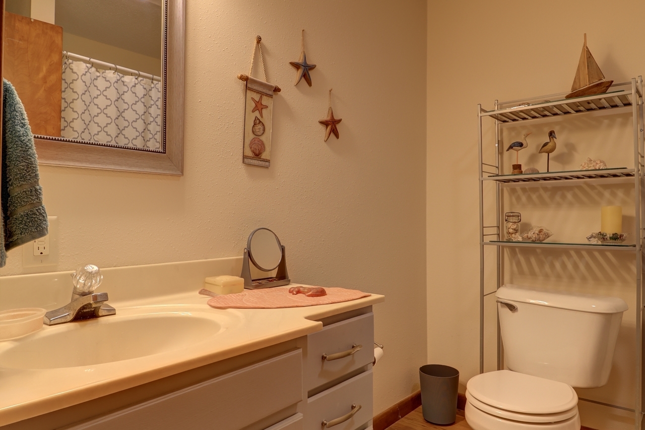 14755 Fenton Road Morrison, IL 61270 - Photo 10 of 34 a bathroom with a sink toilet and vanity