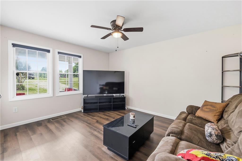 156 Pine Avenue Commerce, GA 30529 - Photo 15 of 35 a living room with furniture and a window