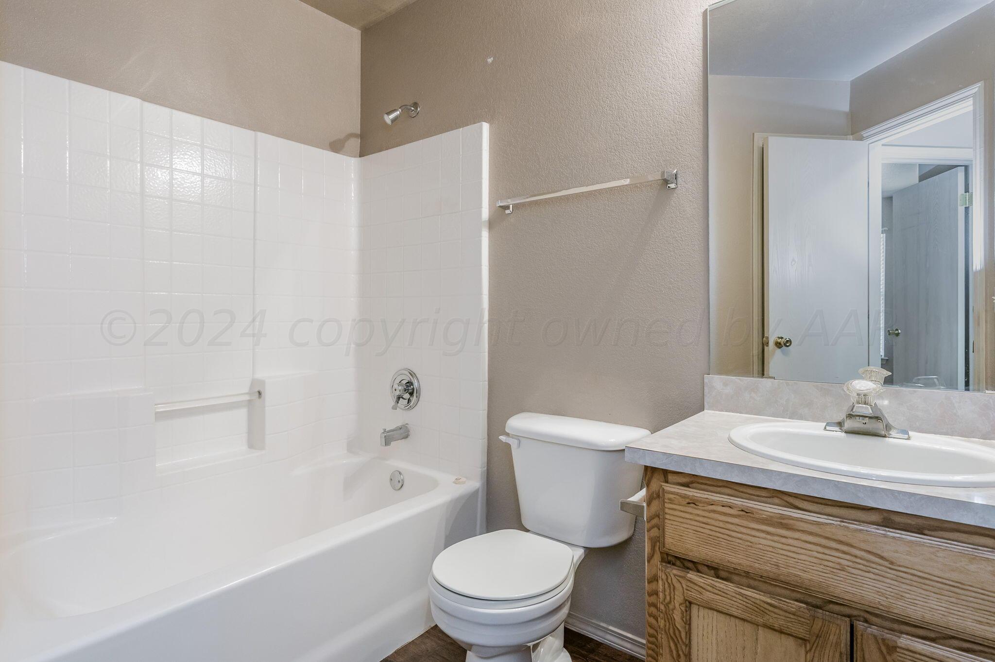 1021 Rushmore Drive Amarillo, TX 79110 - Photo 14 of 20 Hall Bathroom