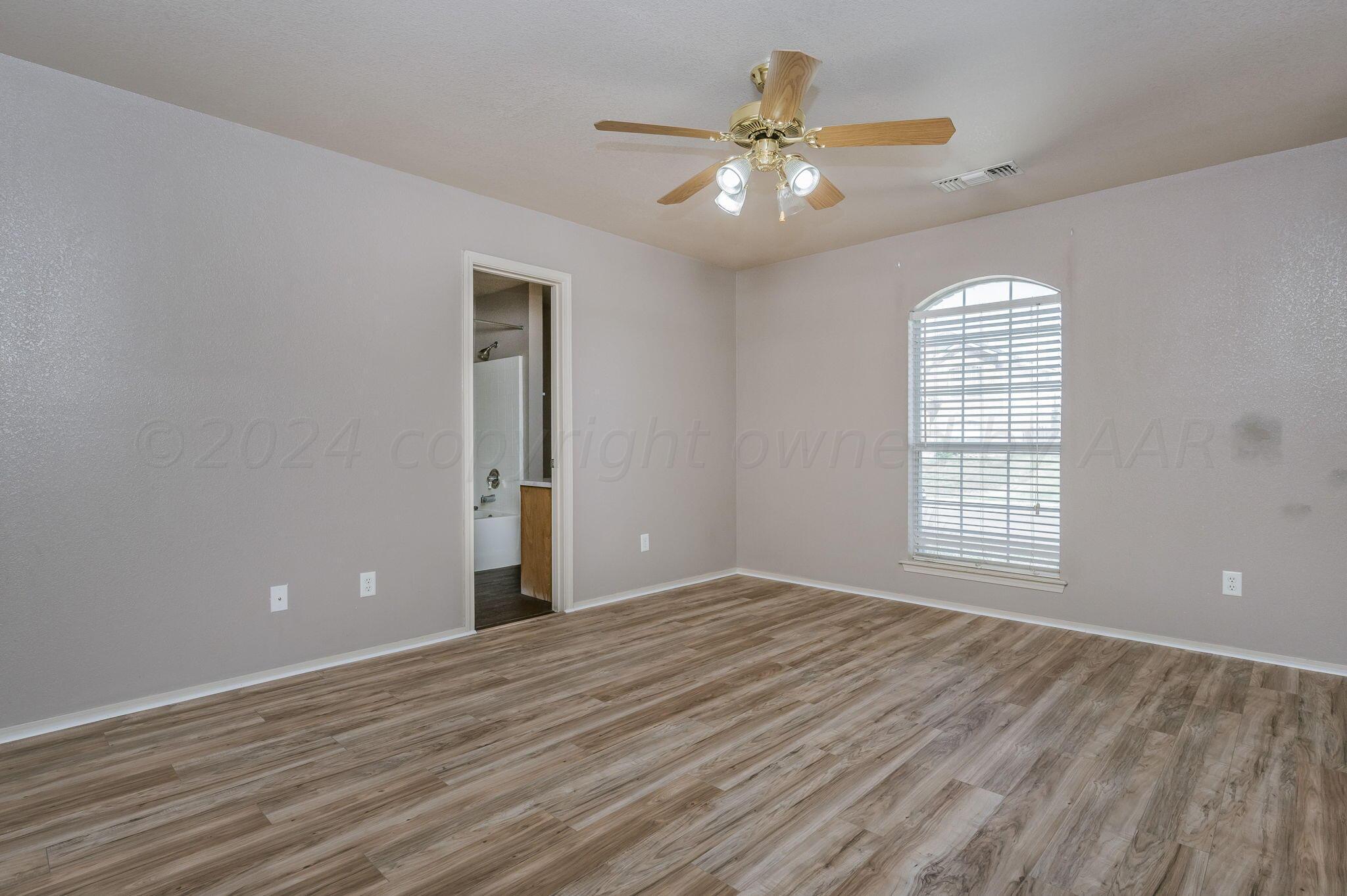 1021 Rushmore Drive Amarillo, TX 79110 - Photo 8 of 20 Master Bedroom