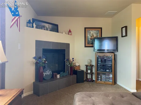 a kitchen with a sink cabinets and window