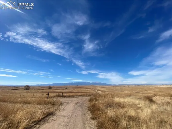 a view of an ocean and mountain