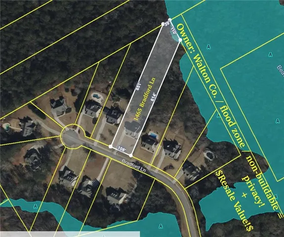 a view of a big house with a big yard and large trees