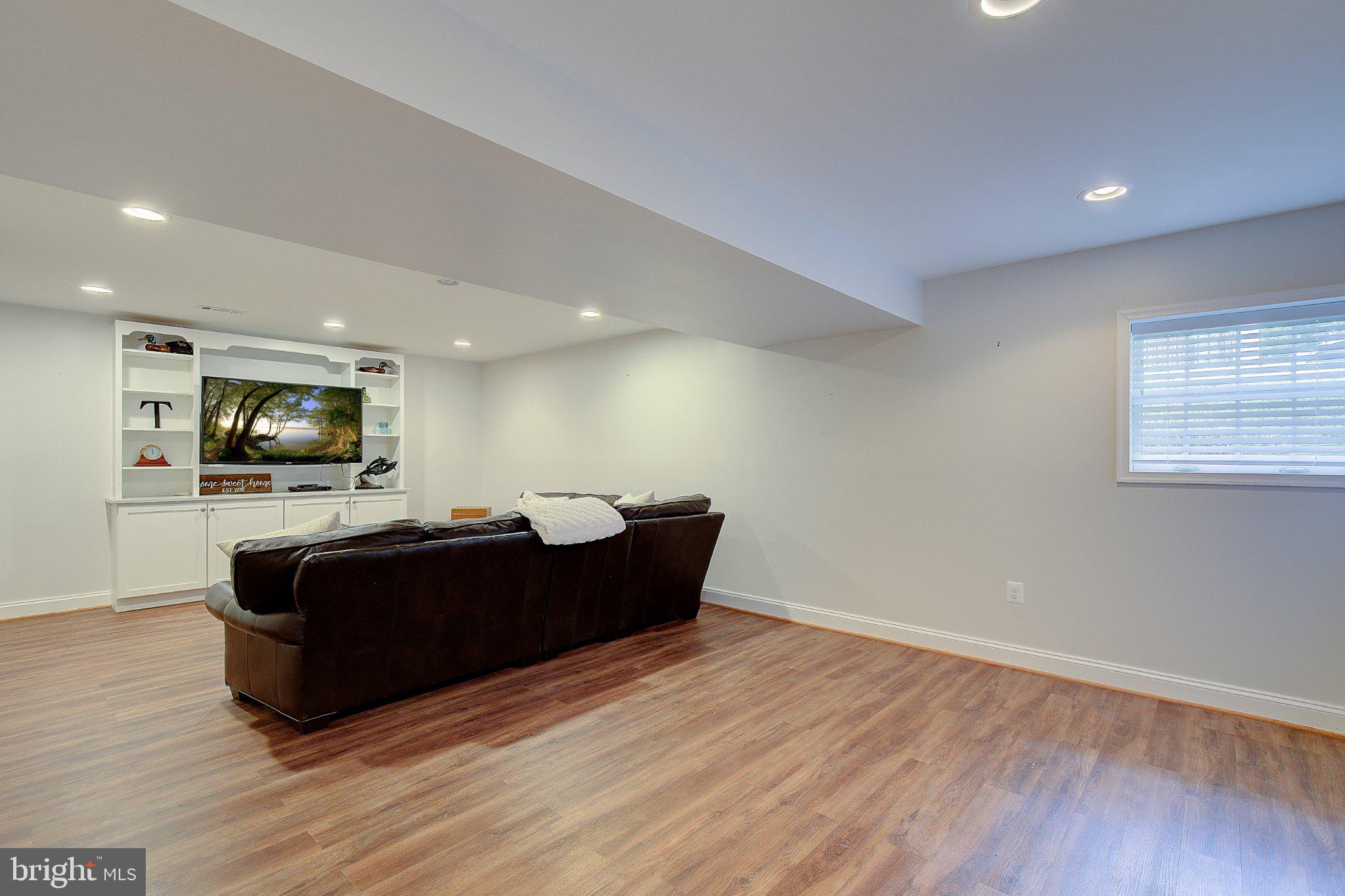 980 Apple Lane Solomons, MD 20629 - Photo 44 of 82 Spacious, modern basement retreat.