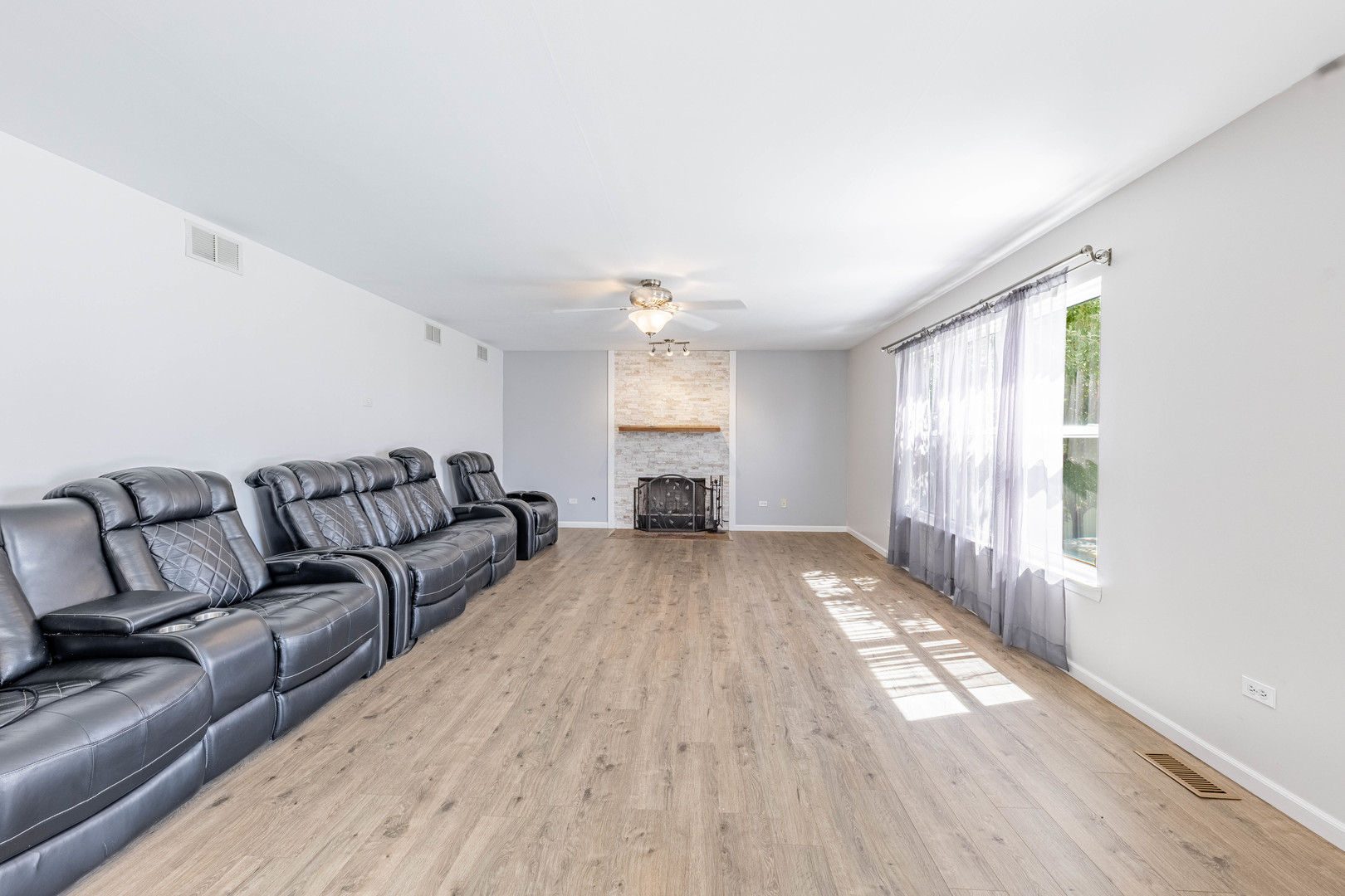 16263 Celtic Circle Manhattan, IL 60442 - Photo 15 of 45 a living room with furniture and a large window