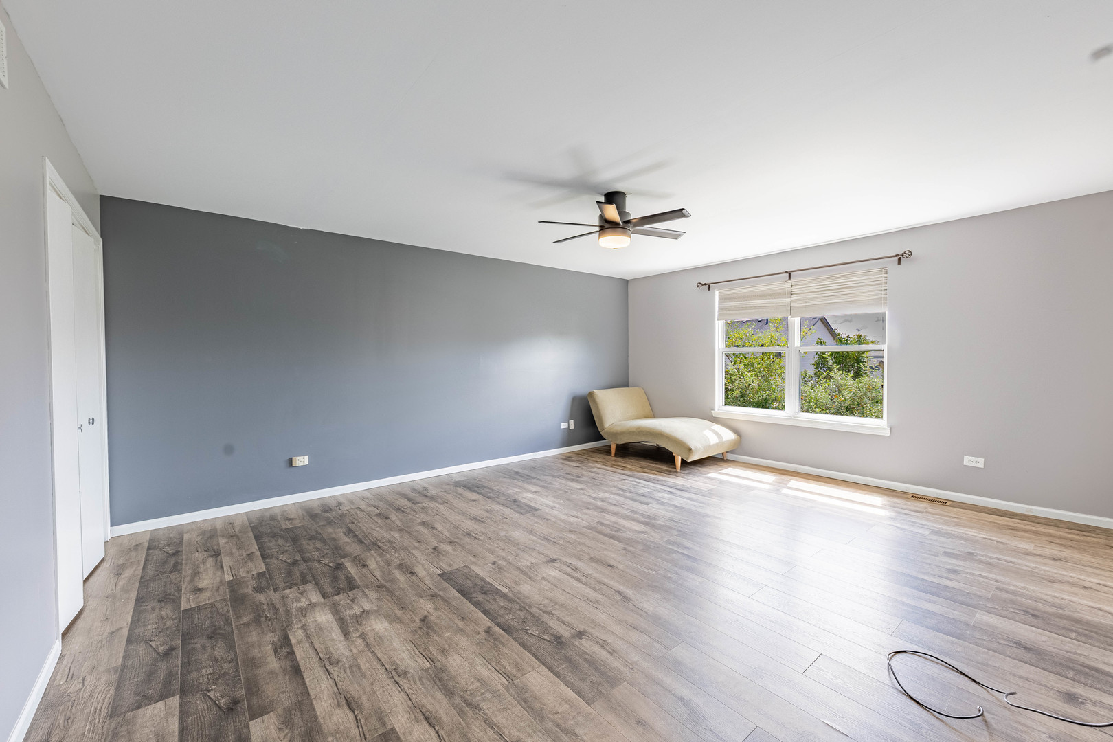 16263 Celtic Circle Manhattan, IL 60442 - Photo 29 of 45 a view of a livingroom with a window and wooden floor