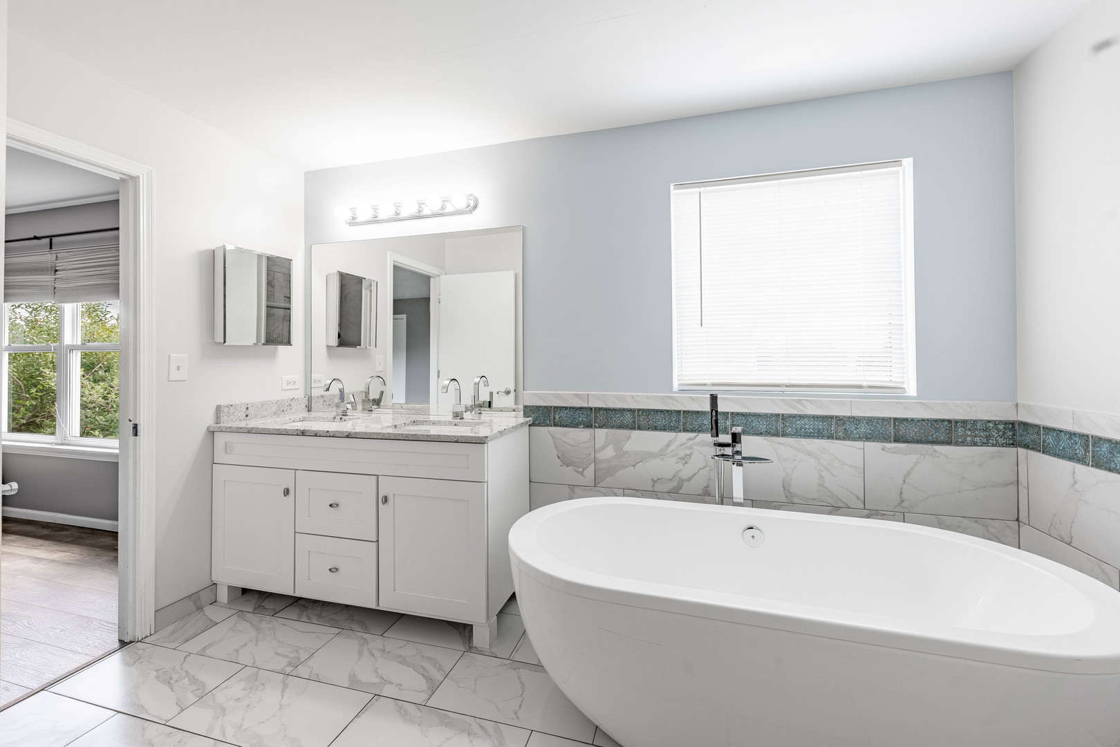 16263 Celtic Circle Manhattan, IL 60442 - Photo 34 of 45 a white bath tub sitting in a bathroom and sink